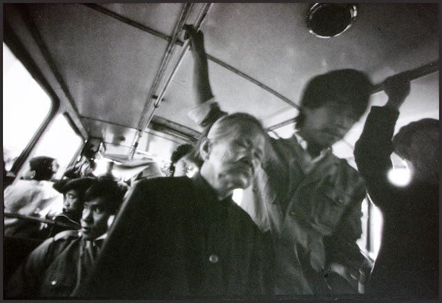 © Mo Yi, Tossing Bus, China 1989.